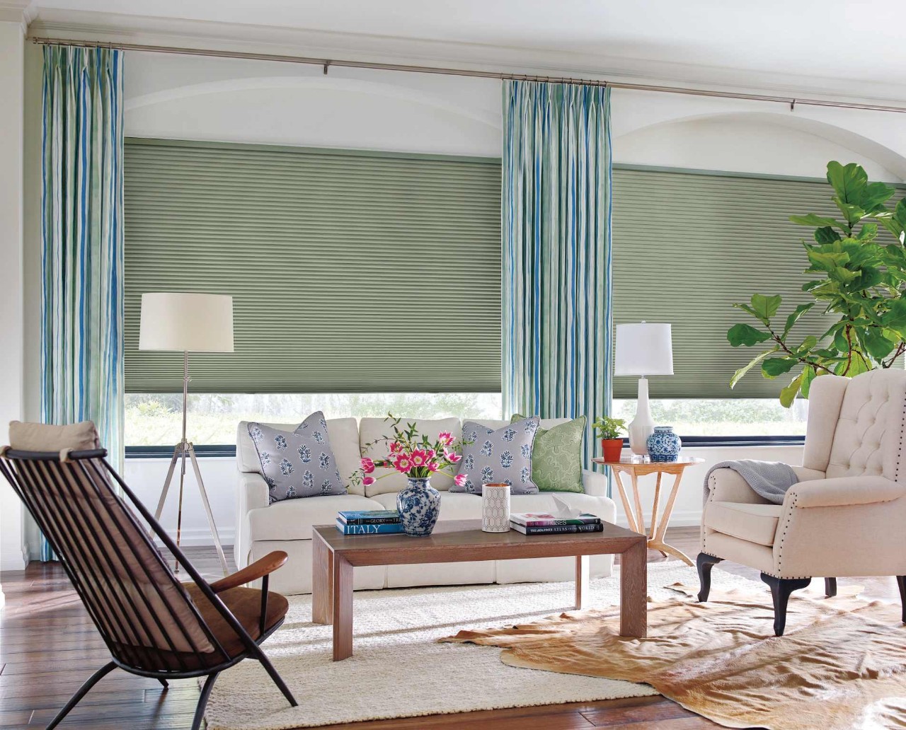 Custom drapery from Ida & Norma’s Drapery adorning window treatments.